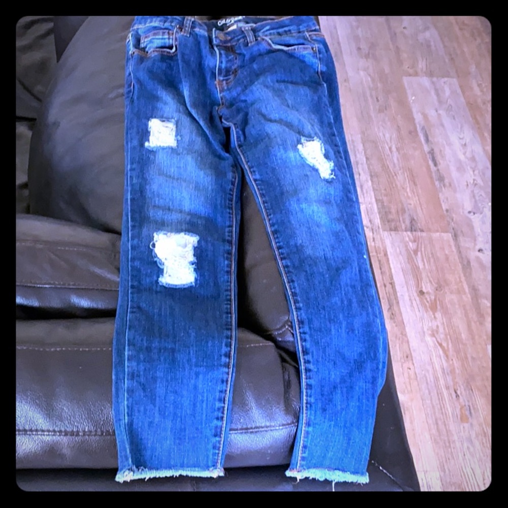 Cat and Jack dark blue jeggings with lacy holes.